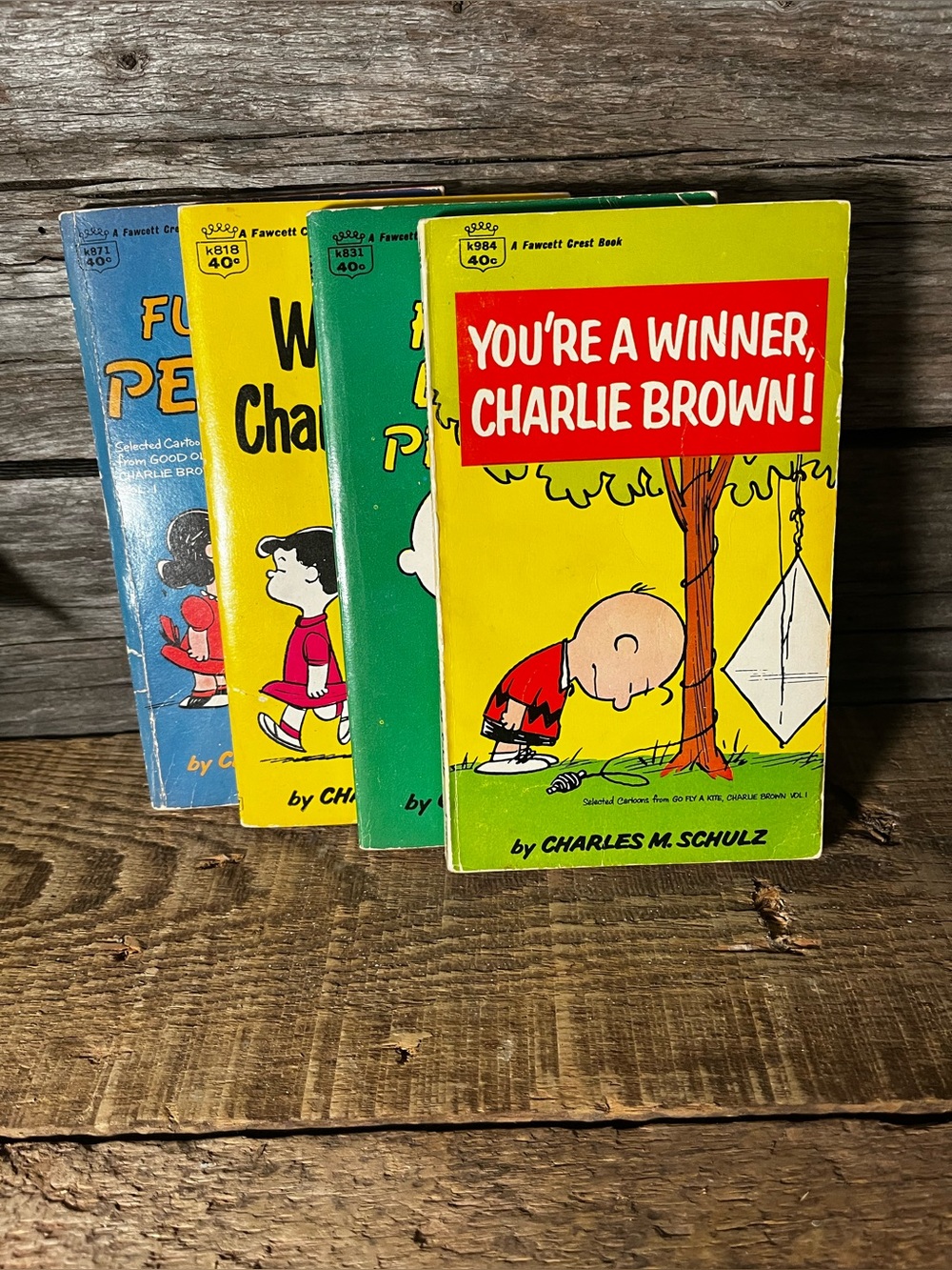 (4) 1960s CHARLIE BROWN Fawcett Paperbacks - Excellent vintage condition